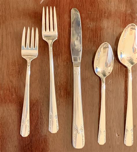 Rogers silverplate silverware. MCM vintage Rogers silver plate flatware tea spoons Esperanto, unused flatware set Set of 14 tea spoons in the Esperanto pattern, 1847 Rogers Bros. This pattern dates to 1967, with a very mid century modern look. ... 