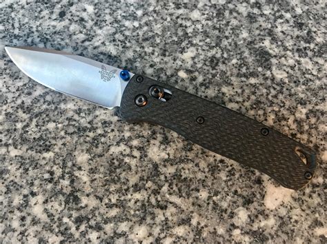 This 535 has a satin CPM-S30V blade and black carbon fiber scales from Rogue Bladeworks. The knife will already come assembled with the scales fitted to the knife. The original blue valox scales will come in the box as well. Features: 3.25" Satin Drop Point Blade in S30V Black Carbon Fiber Rogue Bladeworks handle scales with partial …. 