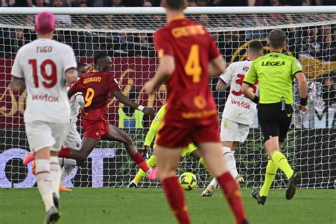 Roma snatches 1-0 win over 10-man Monza. Milan hosts Juventus later looking to move back top