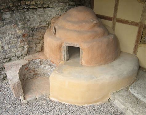 Roman oven. The Roman bakery oven build eventually got started in March after the builders had completed the base for the oven at the correct height to lay the insulation and 60mm thick terracotta baking tiles that formed the baking surface for the oven. The mineral Micafil insulation under the tiles is a modern take on volcanic pumice or a thick layer of ... 