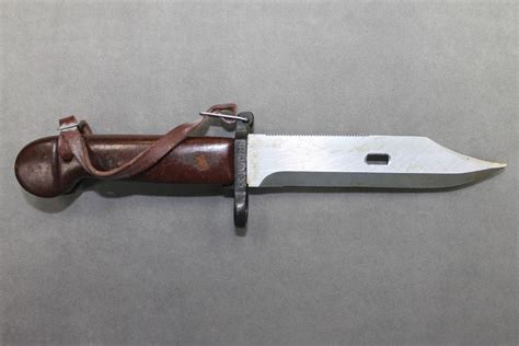 Bayonet Frog w/ D-Ring, Spring Clip & Strap/Stud Closure, Gray Leather, Unissued AK47 Firearm Mfgr: AK47 Product #: 145250. 