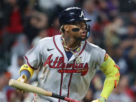 Ronald Acuña Jr. knocked over by fan charging field in Colorado, but Braves star says he’s OK