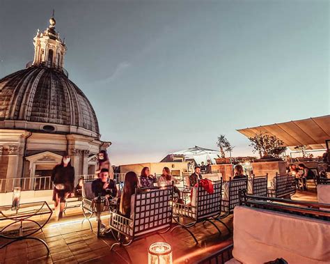 Rooftop bar rome. Apr 4, 2023 · Historic palace with dual rooftop setting. Found in the heart of the historic center of Rome, the fantastic Singer Palace Hotel comes with a lovely, multi-level and dual rooftop setting, including both the rooftop bar Jim's Bar, and The Terraces rooftop restaurant. Set on top of a historic palace fashioned in 20th century style, the Singer ... 