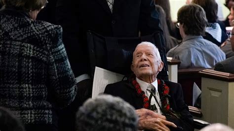 Rosalynn Carter is eulogized before family and friends as husband Jimmy bears silent witness
