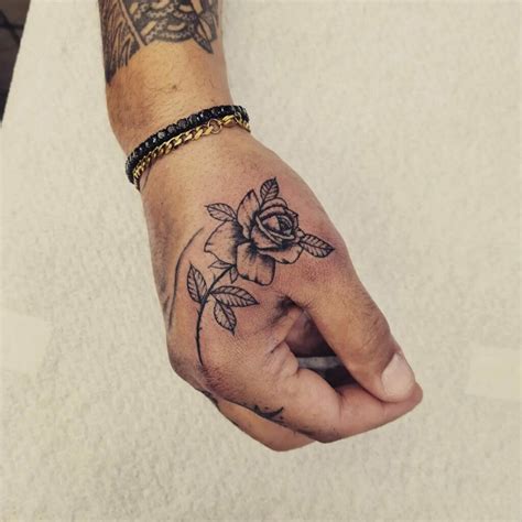 Rose With Thorns Tattoo On Hand Tattoo Designs for Men