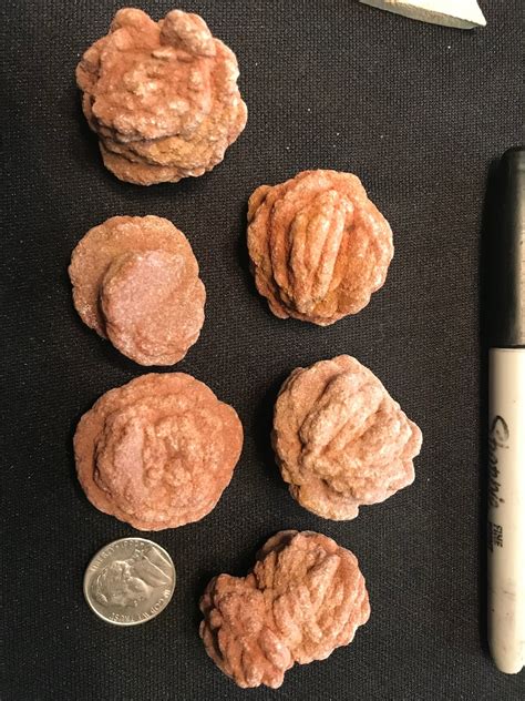Barite specimens from certain locations are brown from sand inclusions, and may occur in beautiful rosette aggregates that strikingly resemble a flower. These are known as Barite "Desert Roses." The mineral Gypsum also contains similar Desert Roses, but Gypsum roses are much light in weight, and are more brittle and thin.. 