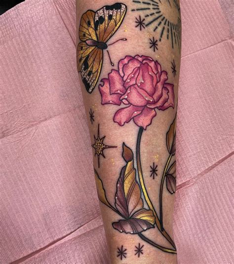 Rose gold tattoo. Dec 26, 2022 · This design, as shown above, is a classic tattoo design. The actual butterfly is inked in a purple hue and looks pretty cute. The stem of the red rose is crafted in a way that showcases the facial structure of a female. The picture is very unique and mesmerizing. The tattoo is drawn at the side of the rib. 