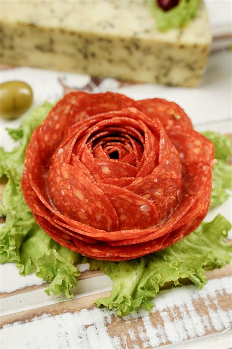 Rose meat. Rose meat involves a meticulous process of slicing cooked beef thinly and arranging the slices in a circular fashion, creating a visual representation reminiscent of a blooming rose. Achieving this effect requires precision in slicing, ensuring that each piece is uniformly thin and delicately layered to form the … 