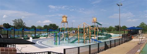 The Rosemeade Rainforest Aquatic Complex is located adjacent to the Rosemeade Recreation Center. The Rainforest section features a zero-depth entry pool, two platform levels with bridge, water cannons, bubblers, spray bars, water slides, a 200 foot lazy river and a 600 gallon dump bucket.. 