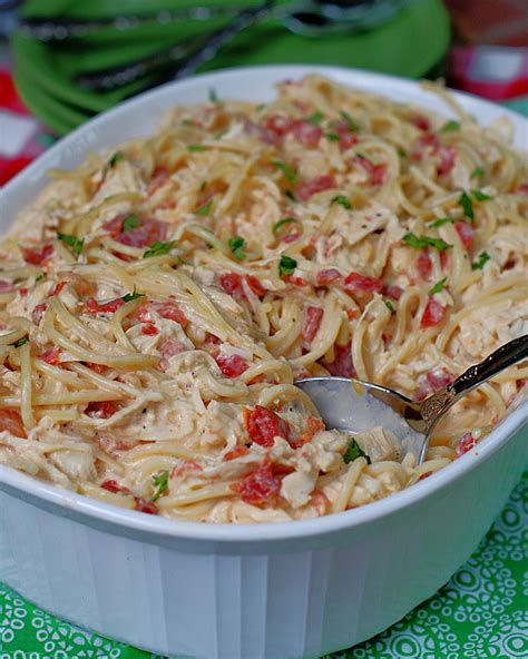 Rotel chicken pasta. Dec 23, 2020 · Drain. While spaghetti cooks, prepare the sauce. In a large skillet over medium-high heat, cook sausage until no longer pink. Drain fat. Add butter and garlic to the skillet and sauté for 1 minute. Add the Rotel tomatoes, cream cheese, sour cream, heavy cream, onion powder, salt, and pepper. Reduce heat to low. 