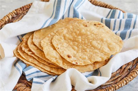 Roti i. The dough should be soft and pliable, if it's too dry add a bit more water as necessary. Cut and roll dough: Cut the dough into 10 equal pieces. Roll out each piece so that it's about 8 inches in diameter over a lightly dusted … 