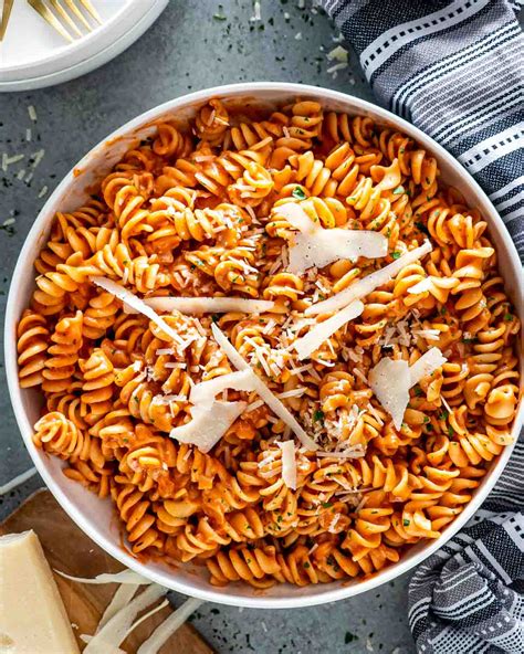 Rotini. Lightly spray a 6-8 quart crock pot with non-stick cooking spray. Add all ingredients except pasta and shredded cheese into a crock pot. Cook on high for 3 hours. Shred the chicken and return to the crock pot. Add rotini noodles and let cook for an hour or until pasta is tender, then add mozzarella cheese. 