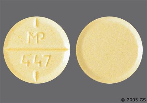 MP 446 Pill - yellow round Pill with imprint MP 446 is 