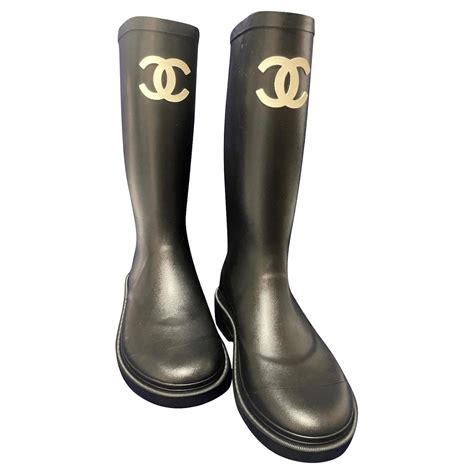 Rubber boots chanel. Chanel Rubber Rain Boots Black. Lowest Ask. $1,899. Last Sale: $2,280. Chanel Thigh High Rubber Rain Boots Black. Lowest Ask. $4,995. Last Sale: --. Burberry Flinton Rain Boots Black Brown Rubber (Men's) 