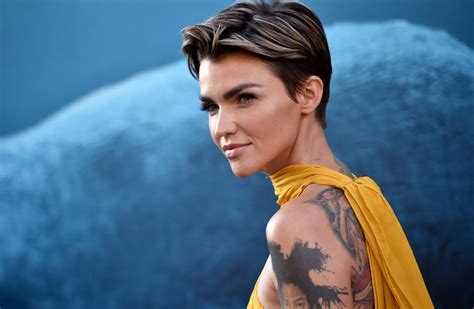 Ruby Rose Distinctive Features. Tattoos covering both of her arms