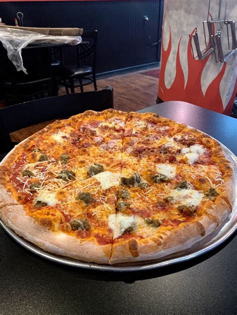 Ruffrano%27s hell%27s kitchen pizza. Address: 1670 E Cheyenne Mountain Blvd Ste E Colorado Springs, CO, 80906-4035 United States 