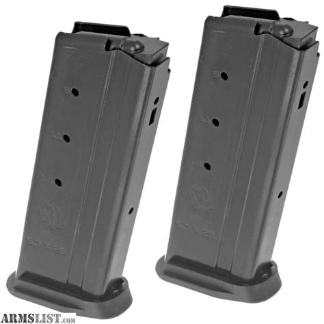 Oct 18, 2023 · This is a factory bulk 2-pack of Ruger-57 10-round magazines in 5.7x28mm. These magazines also fit Ruger LC carbines in 5.7x28mm. The upper half of these magazines is comprised of blued steel, and the lower half is made of a durable polymer. These magazine feature side-facing, numbered witness holes, as well as front-facing witness holes. 