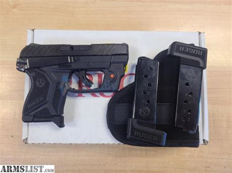 RUGER LCP 2 W/ VIRIDIAN E-SERIES LASER. The wallet holster is designed to fit comfortably in your back pocket, or cargo pocket. The holsters are custom molded for each gun model to ensure a perfect fit..