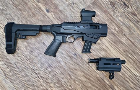 Here are the top accessories to make it even better! There is no end of accessories available for the Ruger PC Charger, from parts to arm braces. The muzzle brake and oversize red controls are from Tandem Kross, the TG9 trigger pack is from Volquartsen, and for folding arm braces there’s a prototype Gear Head Works above an …