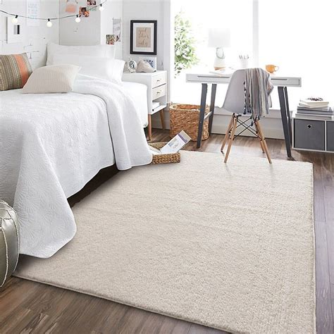 Rugs for dorm rooms. Living room rugs, kitchen rugs, bedroom rugs, rugs for the entryway, office rugs, dorm rugs, and dining room rugs. Available in a variety of area rug sizes: area rugs 3'3"x5, area rugs 5x7, area rugs 7'10"x10, area rugs 6x9, 6' round rugs, area rugs 3x5, 2x7 runner rugs, 2x3 rugs. Pile Height: 0.35'' Construction: Machine Made; 