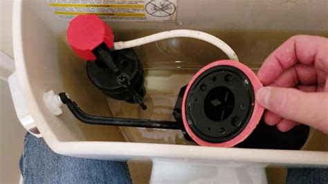 There is a rod that the handle raises when you are flushing can knock the tube out. When the tube is too short, raising the handle can knock it off, and it will pop out. Worn Out Bottom Seal. When the bottom seal of the drain base wears out, you will face this issue. A worn-out seal makes it hard to push down the handle.. 
