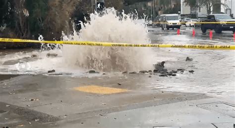 Ruptured water main causing traffic delays in Van Nuys