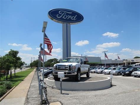Russell and smith ford dealership. The Smith family started in the automotive business in 1917 in Yorktown, TX. W.C. Smith moved to the Houston area and partnered with the Russell family in 1965 to form Russell & Smith Ford Inc. Lindsey G. Russell's legacy passed down to his son, Bill Russell and Ivy-Russell Motors became Russell & Smith Ford, Inc. The dealership continued to ... 