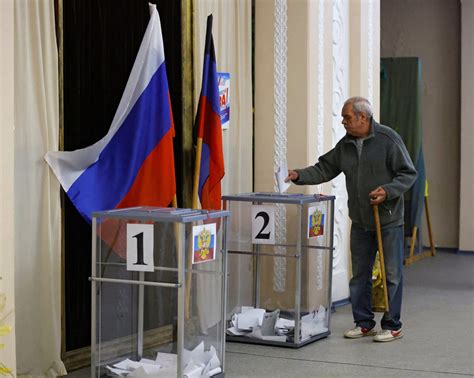 Russia’s election commission says the ruling party wins the most votes in occupied Ukrainian regions