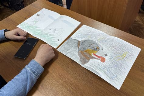 Russia convicts father of teen who drew antiwar picture