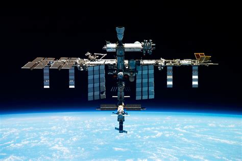 Russia reports coolant leak in backup line at space station and says crew not in danger
