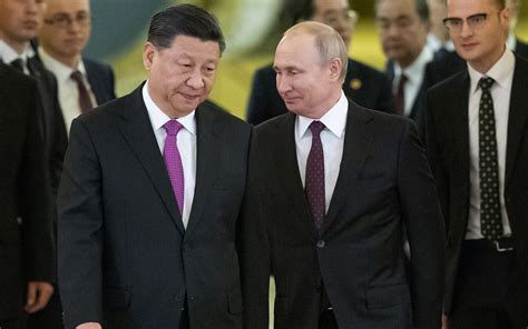 Russian President Putin and Chinese leader Xi meet in Beijing and call for close policy coordination