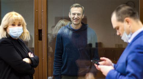 Russian authorities raid the homes of lawyers for imprisoned opposition leader Alexei Navalny