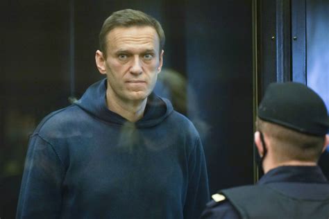 Russian court sends an associate of Kremlin foe Navalny to prison for 7 1/2 years