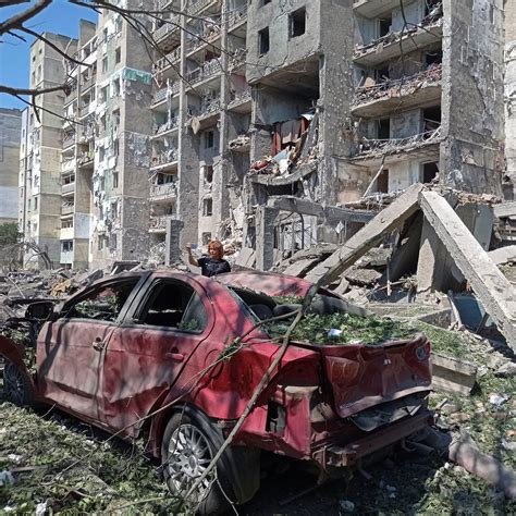 Russian missiles strike an apartment building, killing at least 4 in Ukrainian leader’s hometown