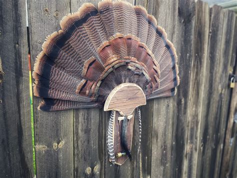 Turkey Mounting Kit, Gray. Item Number: 42174. Our Turkey Mounting Kits work perfectly to mount your turkey fan and beard. Generous front face metal panel covers quill feathers easily. Everything is included to create a quality display. A unique rustic metal finish available in four colors.Each color complements the natural color variation of .... 