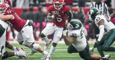 Rutgers rallies from 18 points down to beat Michigan State 27-24 behind Monangai’s 148 yards and TD