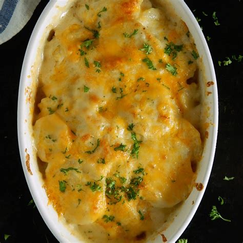 Ruth chris au gratin potato recipe. Dot the potatoes with the last tablespoon of butter. Cover with foil and bake for 40 minutes. Remove the foil and bake until golden and bubbly, 10 more minutes. 
