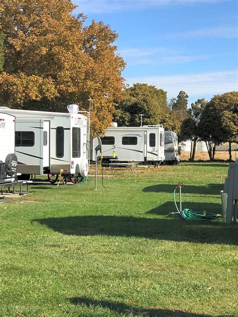 Rv camping ground. Second-row spaces will only accommodate RV’s up to 45 feet in length. All lengths include overhang. All RV’s parked in the front row campsites (1 thru 20) must back into their spaces and may not overhang the marked yellow safety lines. This policy is strictly enforced. Fire pits must be a minimum of 8 inches off the ground. 
