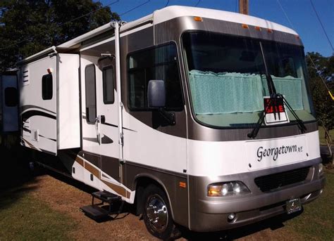 RV manufacturers state that RVs typically get between 6 and 12 miles per gallon. The type of RV, type of fuel and weight of the loaded RV all influence the mileage.. 