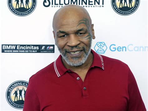 SEE IT: Mike Tyson in wheelchair weeks after claiming his death is ...