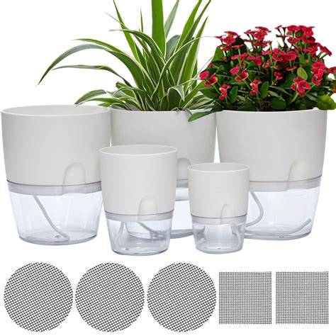 self watering planter pots self sipper pot A self-watering pot is a ... - raincitystudios.com
