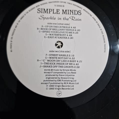 SIMPLE MINDS SPARKLE IN THE RAIN 12 INCH WHITE VINYL LP