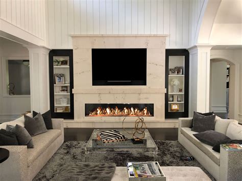 Sleek Linear Fireplace Ideas with TV Above - balustradellc