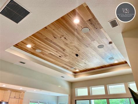 Sleek Wood Plank Ceiling Installation - balustradellc