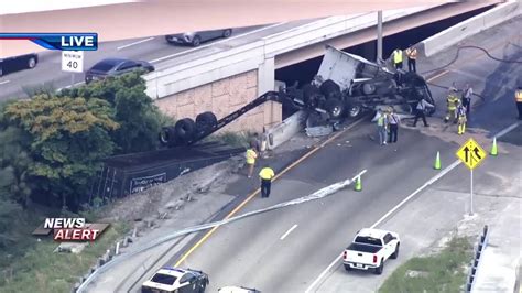 SR 836 ramp to NB Palmetto reopens following tractor-trailer crash