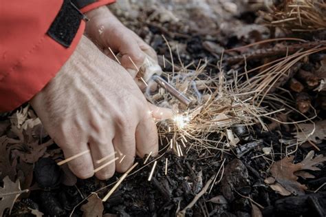Starting A Fire Using The Flint And Steel Method - balustradellc