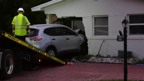 SUV plows into Plantation home, sending driver to hospital; officials believe medical issue led to crash