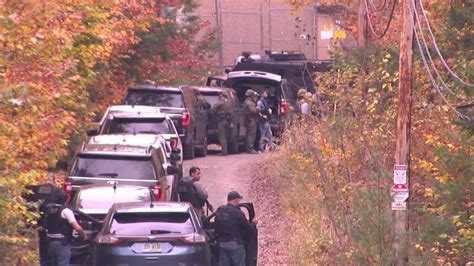 SWAT approaching home searching for Maine manhunt suspect