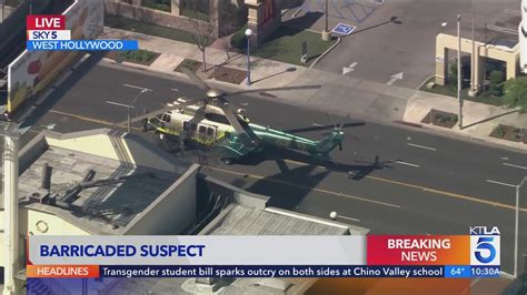 SWAT helicopter lands on La Brea Avenue amid assault investigation in West Hollywood