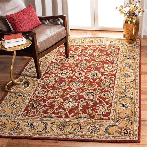 SAFAVIEH Heritage Collection Area Rug - 7'6" x 9'6", Rust & Beige, Handmade Traditional Oriental Wool, Ideal for High Traffic Areas in Living Room ... SAFAVIEH Antiquity Collection 4' x 6' Grey/Multi AT824B Handmade Traditional Oriental Premium Wool Area Rug. Oriental. 4.5 out of 5 stars 231. $117.08 $ 117. 08 ($4.88/Sq Ft) List: $384.00 $384. .... 